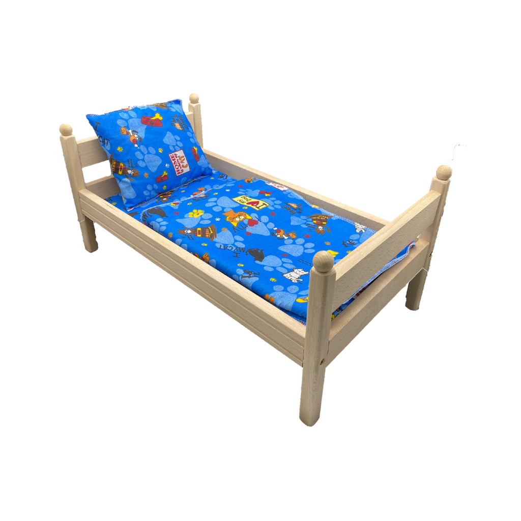 Die Holzwarenfabrik Puppenbett mit Bezug in blau  (55 cm)